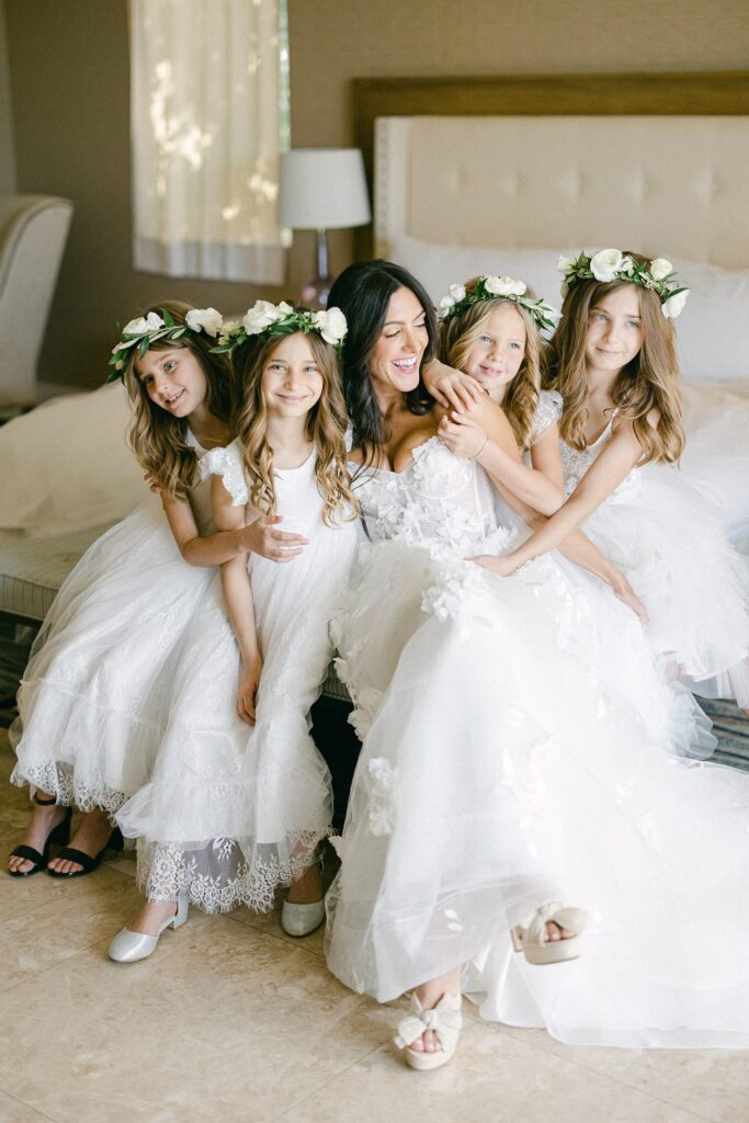 group photo of the bride and her four flower girls