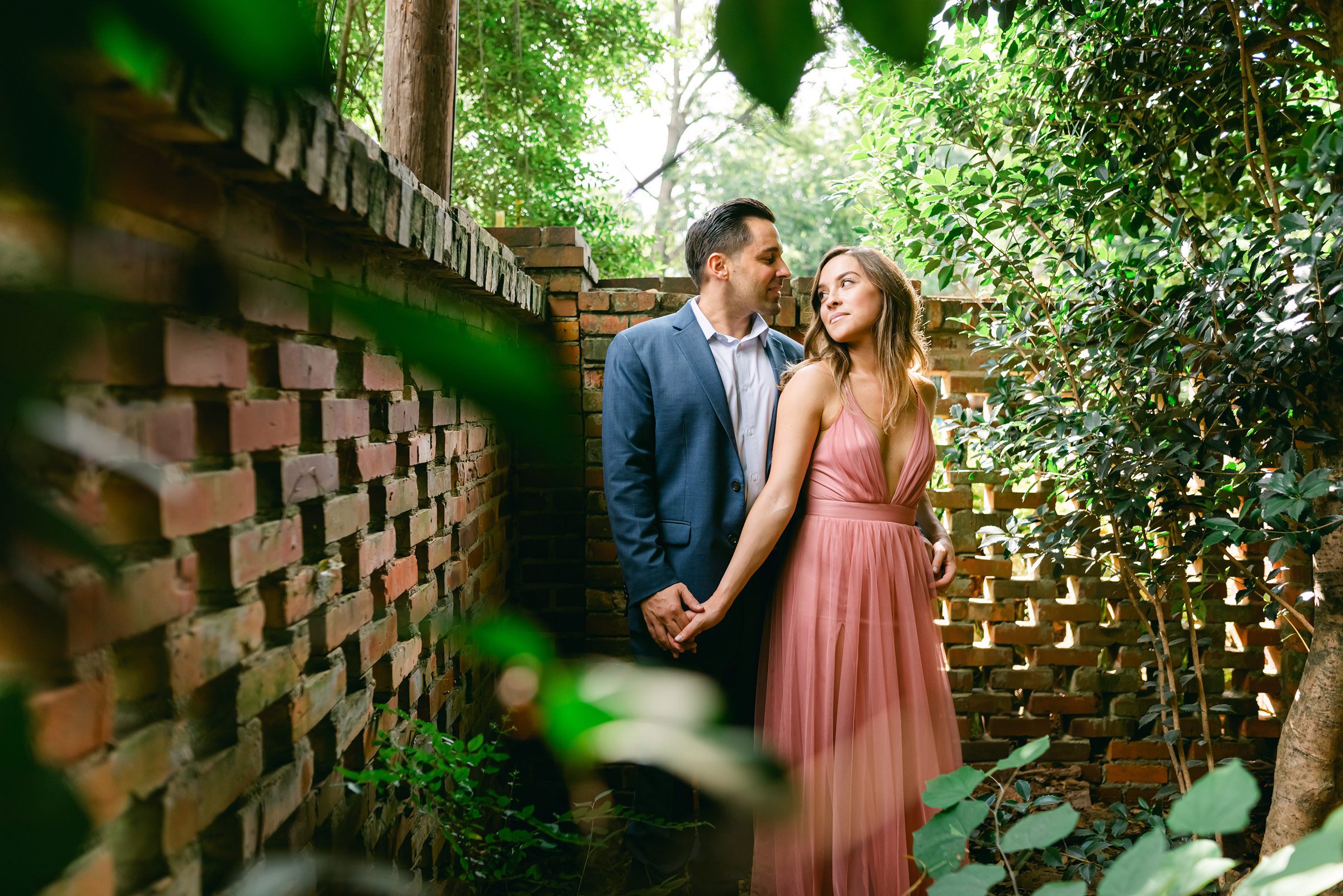 the couple looking at each other intensely during their wing haven garden engagement session