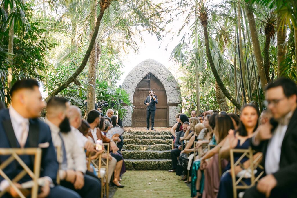Ronny Moreno Violinist playing in the wedding ceremony grotto at the Cooper Estate.